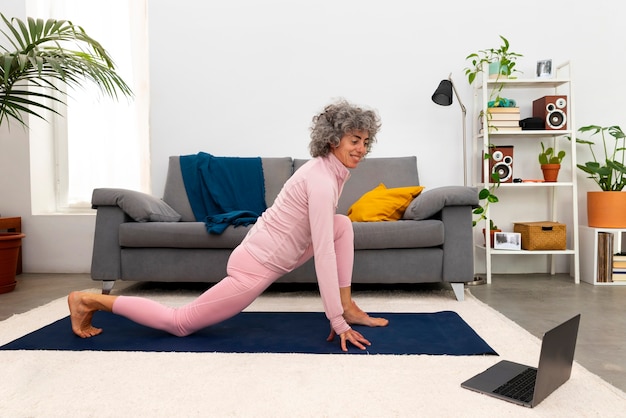 Person doing seated arm exercises with resistance band