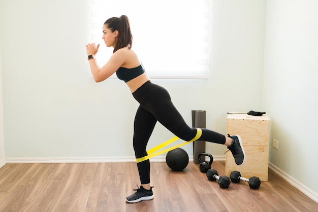 Proper banded squat technique with knees tracking outward