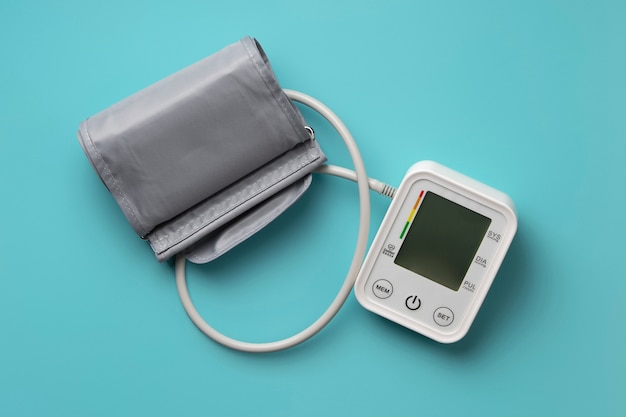 Person checking blood pressure at home