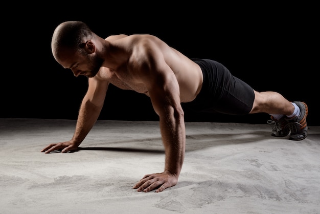 Person performing bodyweight squats and push-ups