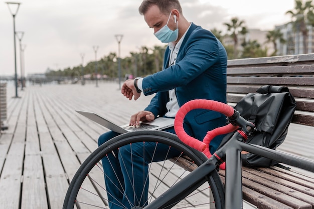 Person checking cycling app on smartphone after a ride