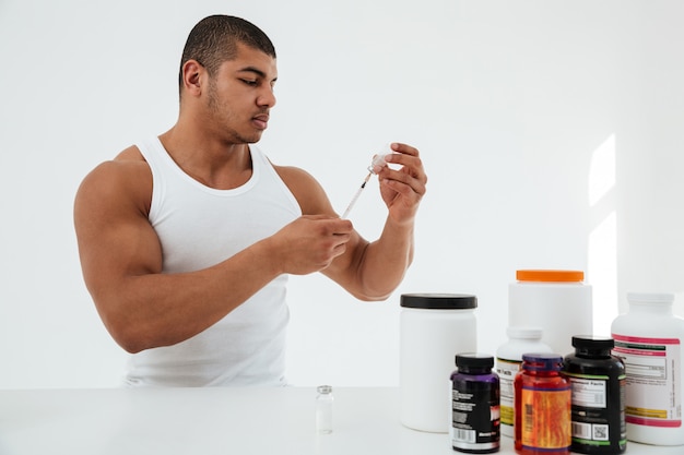 Illustration of kidney and liver with creatine safety info