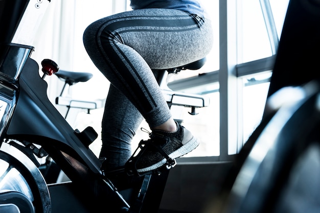 Person cycling on a stationary bike
