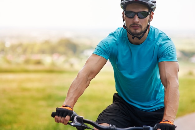 Cyclist stretching before a ride