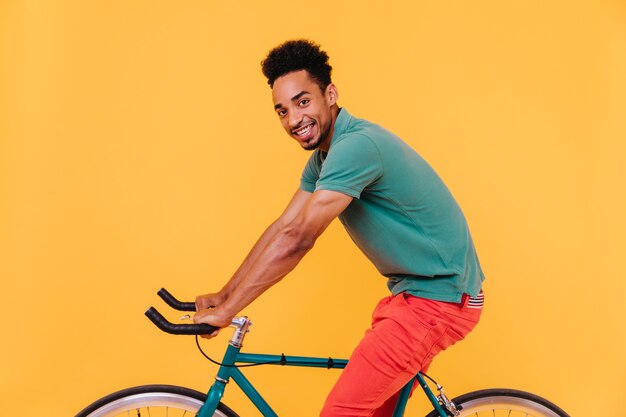 Cyclist performing a stretch after a ride