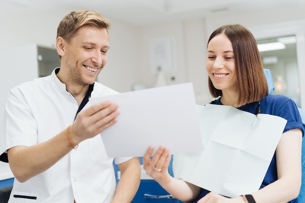 Dentist consulting with medical team