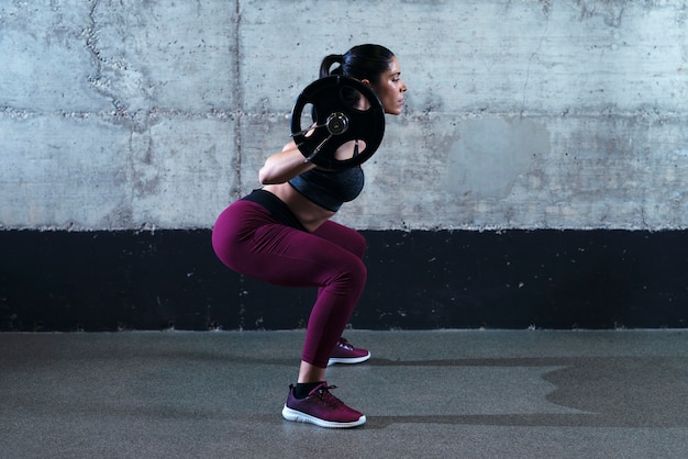 Athlete performing slow eccentric squat