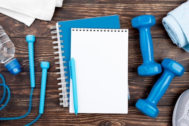 New mom writing in a fitness journal