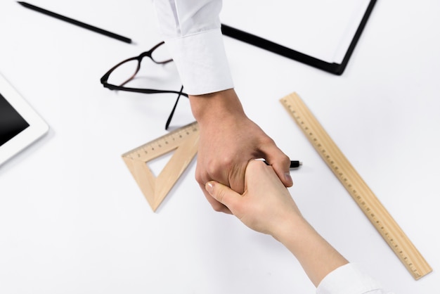 Person measuring flexibility with a tape or using a sit-and-reach box