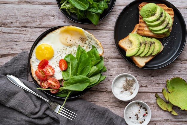 Balanced breakfast with eggs, avocado, and fruit