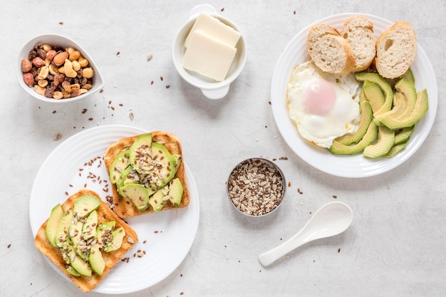 Delicious low-carb breakfast with eggs, avocado, and greens