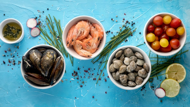 Variety of shellfish and white fish on ice