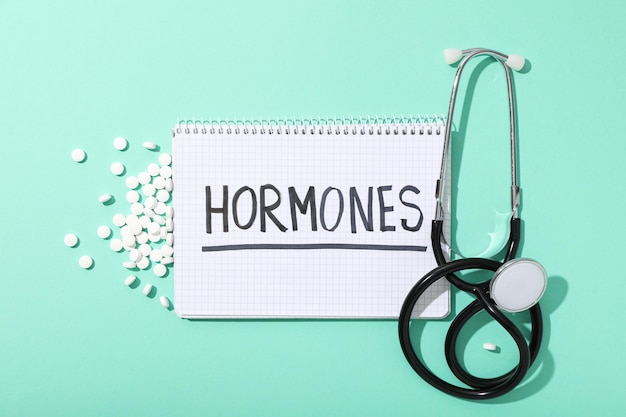Woman holding her abdomen, experiencing menstrual discomfort