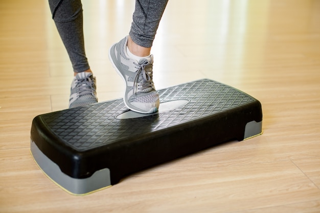 Person walking on an inclined treadmill