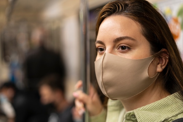 People wearing masks in an indoor public setting