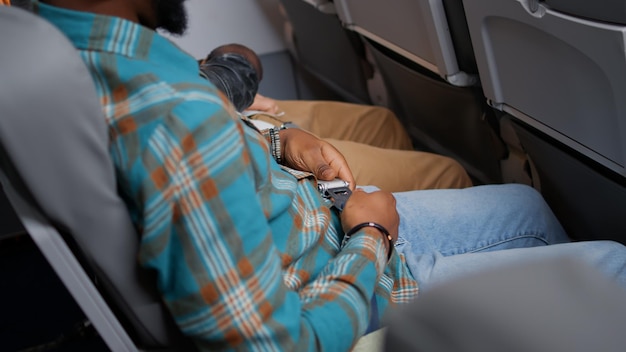 Traveler managing jet lag with hydration and light