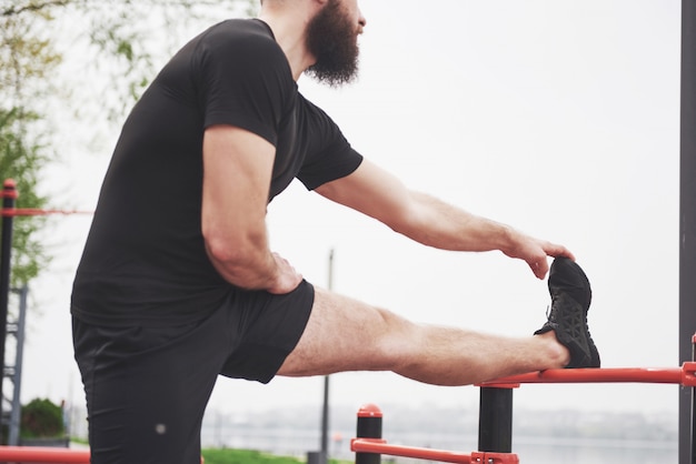 Senior performing seated shoulder rolls and arm circles