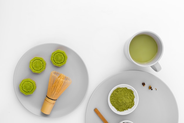 Matcha tea on a desk with laptop