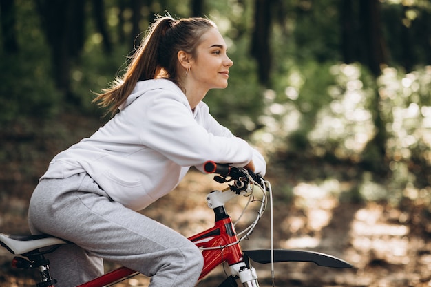 Student cycling mindfully on a quiet path