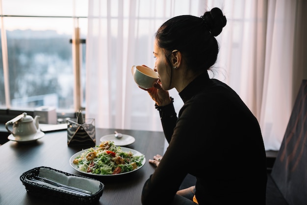 Person meditating before a meal