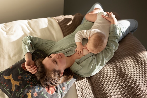 New mom resting with baby