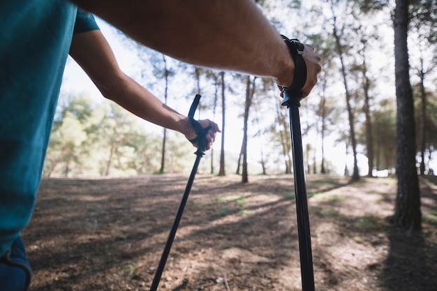 Illustration showing proper Nordic walking posture and pole use