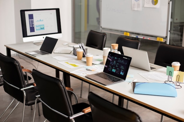 Office desk with laptop, USB devices, and organized cables