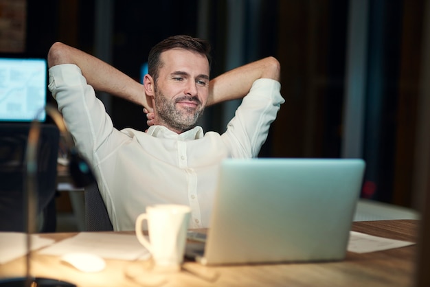 Person doing legs-up-the-wall pose at home