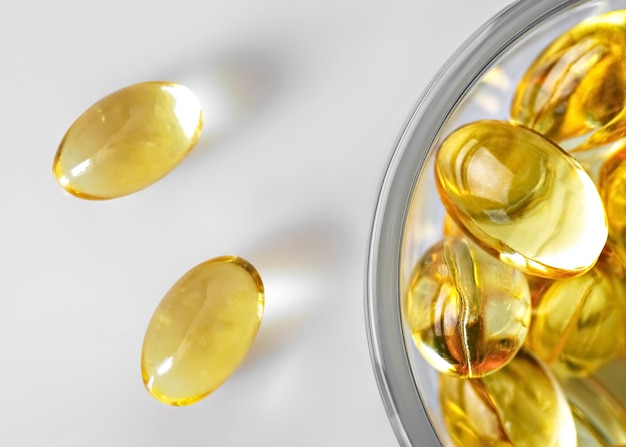 Fish oil capsules and fresh salmon