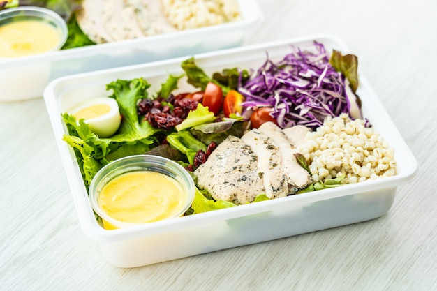 Sample PCOS-friendly meal prep containers with colorful vegetables and protein