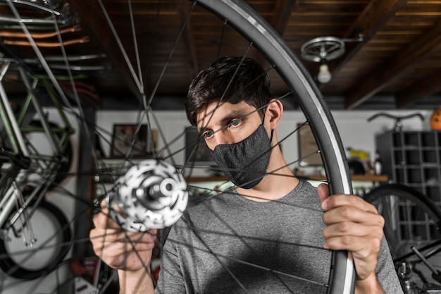 Cyclist performing a squat in gym