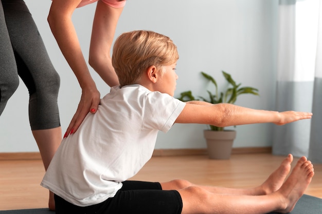 Teen performing a squat with correct knee alignment