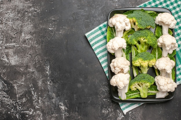 Side-by-side comparison of raw and steamed broccoli