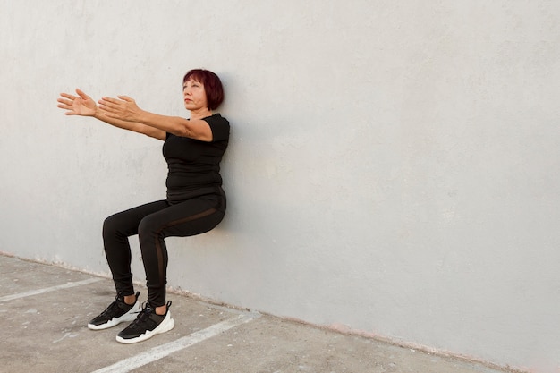 Seated leg raises at desk