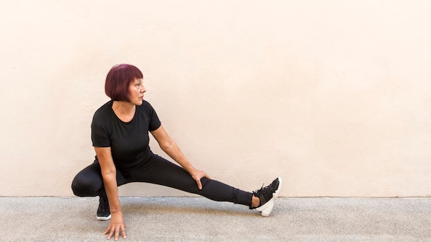 Person performing seated marching with good posture