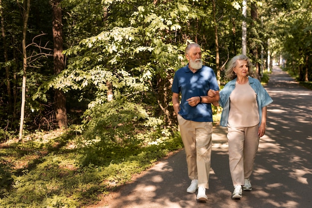 Senior couple walking in a park