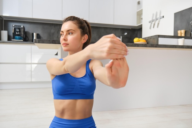 Swimmer performing shoulder circles in water