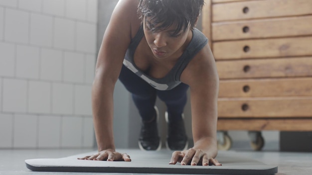 Person performing strength exercises with proper form