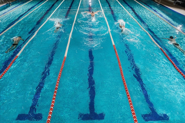 Person swimming freestyle in a pool