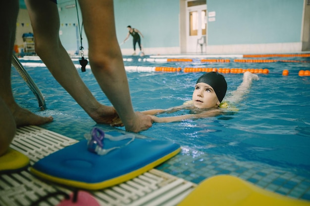 Beginner swimming laps in a pool