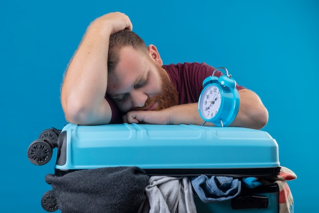 Traveler using sleep mask and earplugs
