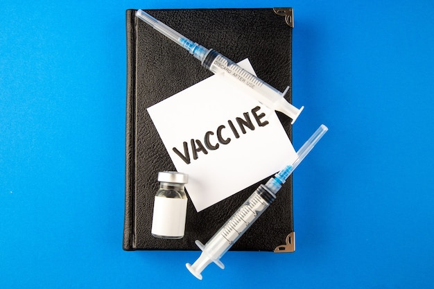Healthcare worker speaking with community members about vaccine safety