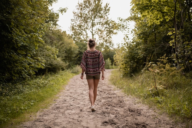 Person walking on a peaceful outdoor path