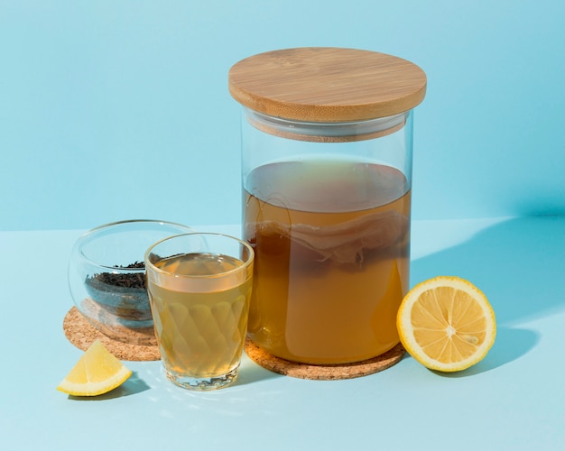 Glass jar with infused water and fresh fruits