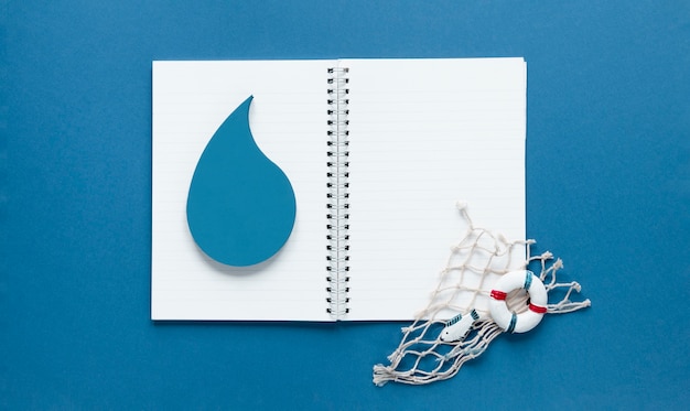 Notebook tracking daily water intake and meal hydration levels