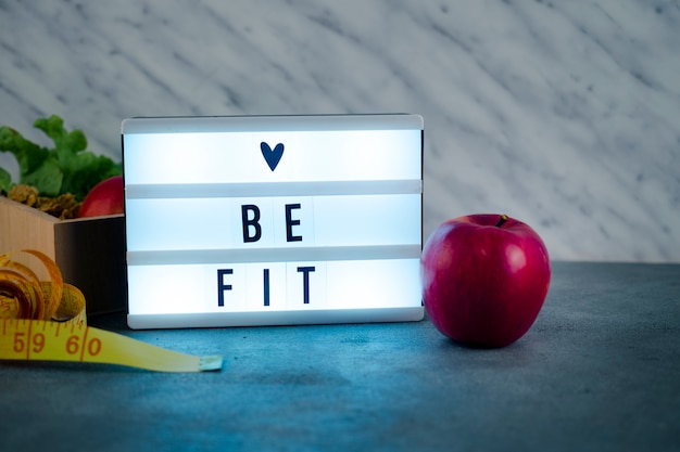 Person checking off weight loss habits on a clipboard