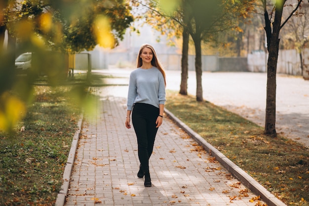 Woman walking in the park at moderate intensity