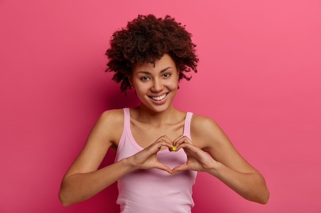 Woman monitoring heart rate with wearable device