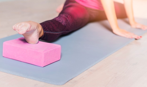 Yoga blocks assisting in stretching